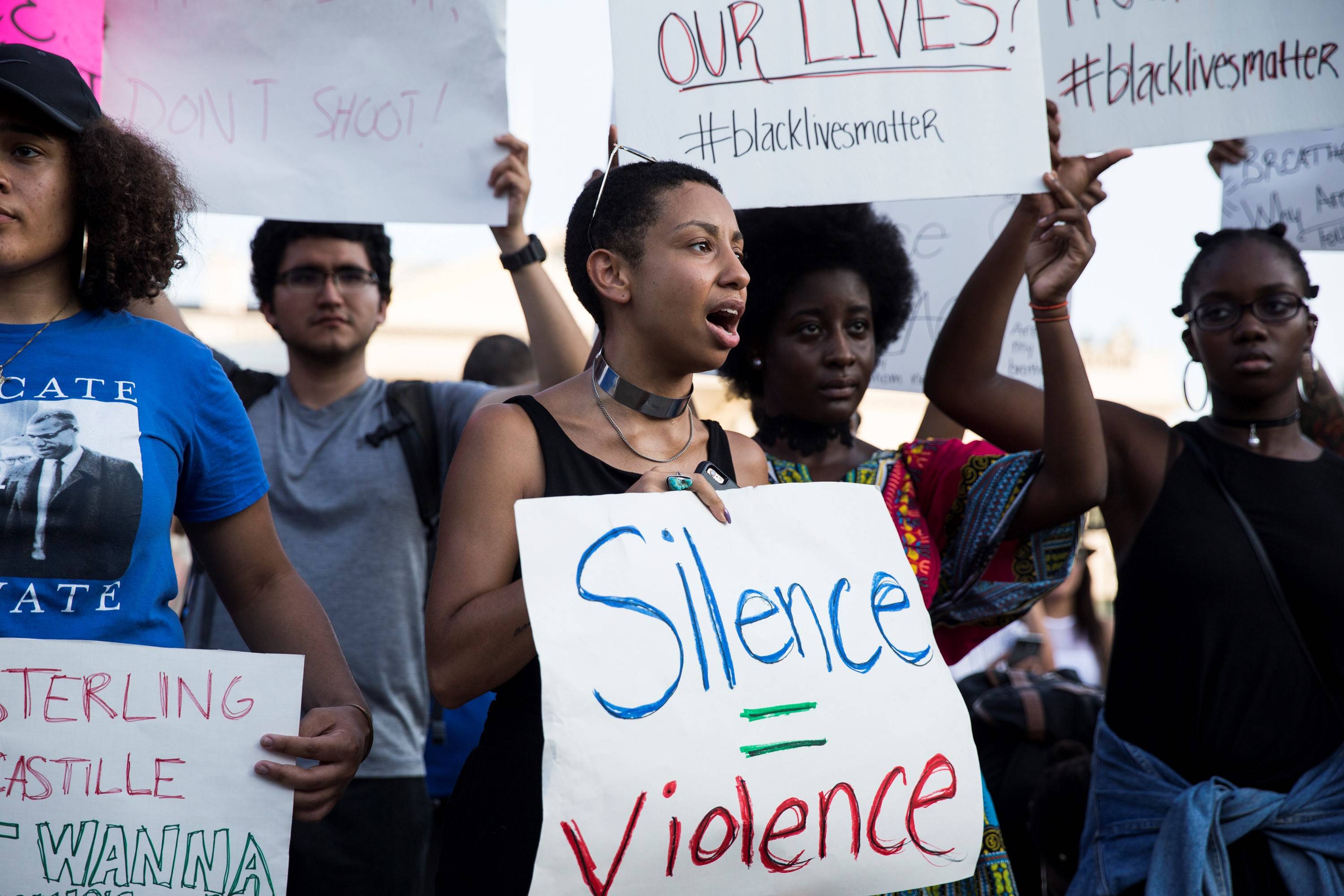 WASHINGTON, USA - JULY 8: Protestors march in front of the White House for Police Reform in Washington, USA on July 8, 2016. Tensions have been renewed after two black men, Philando Castile in Minnesota and Alton Sterling in Louisiana, were killed by Police. (Photo by Samuel Corum/Anadolu Agency/Getty Images)