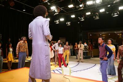The &quot;Soul Train&quot; gang listens intently to Don Cornelius. - (Photo: Annette Brown/BET)