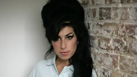 Worst: Amy Winehouse Dies - She had been teetering on the brink of destruction for years, but when Amy Winehouse finally succumbed to her demons on July 23, at the young age of 27, the world lost one of the greatest talents of this generation. After weeks of speculation, a coroner confirmed that Winehouse died of alcohol poisoning.&nbsp;(Photo: AP Photo/Matt Dunham)