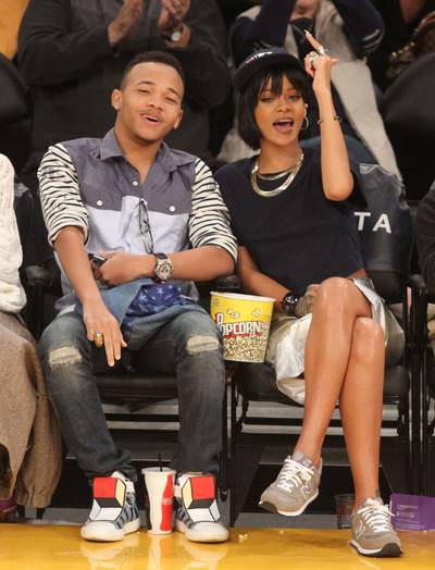 Big Sister - Rihanna hangs with her baby brother, Rajad, courtside at the L.A. Lakers versus Portland Trail Blazers game held at the Staples Center in downtown Los Angeles.&nbsp;(Photo: London Entertainment / Splash News)