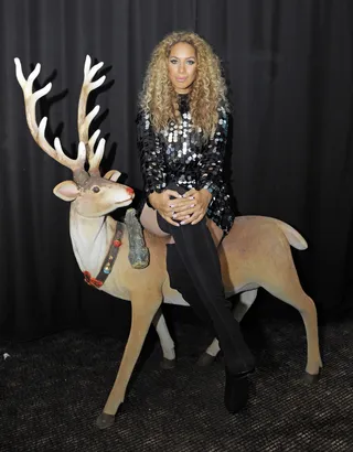 Oh, Rudolph - Leona Lewis poses for pictures on a life-sized stuffed reindeeer backstage at G-A-Y nightclub before hitting the stage to perform in London. &nbsp;(Photo: Chris Jepson/WENN.com)