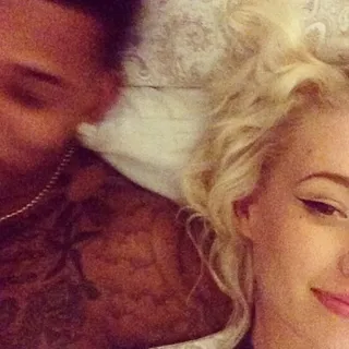 Iggy Azalea @thenewclassic - Iggy posted this cutsey bedroom pic of her and her baller boo Nick Young under the covers. The New Classic raptress made a love connection with the Los Angeles Lakers player over Twitter.(photo: Instagram/thenewclassic)