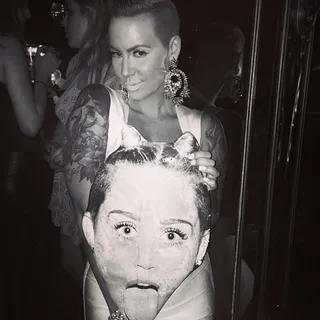 Wiz Khalifa @mistercap - Amber gets cheeky with a Miley Cyrus cut-out at the tongue wagging star’s 21st birthday celebration/AMA after party Sunday night.(Photo: instagram/mrcap)