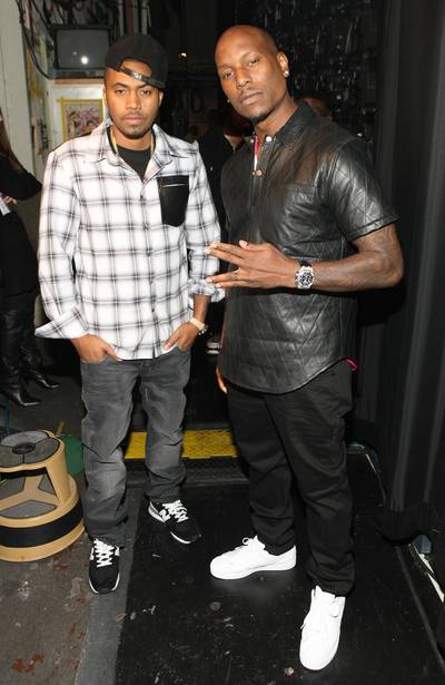 Brothers - Nas and Tyrese pose for a pic backstage like they're brothers. The spirit of their new film, &quot;Black Nativity&quot; must be rubbing off on them. (Photo: Bennett Raglin/BET/Getty Images for BET)