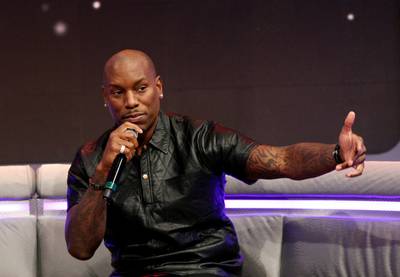 Right! - Actor Tyrese turns the tables and ask the livest audience a few questions. (Photo: Bennett Raglin/BET/Getty Images for BET)