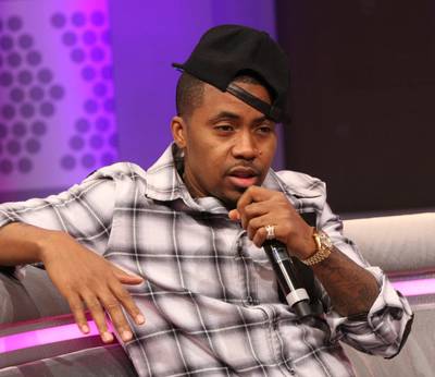 OG - Recording artist Nas sits back and relaxes on the 106 couch. (Photo: Bennett Raglin/BET/Getty Images for BET)