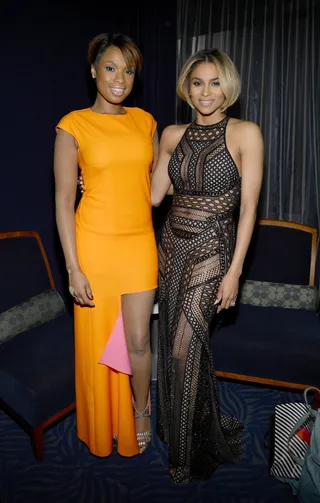 Songstresses - Jennifer Hudson and singer Ciara strike a pose backstage at the 2013 American Music Awards at Nokia Theatre in Los Angeles.&nbsp;(Photo: Larry Busacca/AMA2013/Getty Images for DCP)