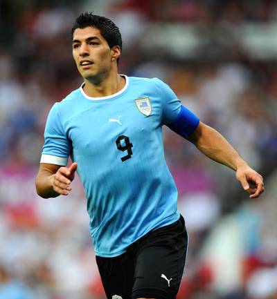 Luis Suarez Apologizes for Biting Player - After biting Italy’s Giorgio Chiellini in a match last week, Uruguay’s Luis Suarez has issued an apology. Included in the statement he posted on his Twitter account Monday were the bullet points: “I deeply regret what occurred,” “I apologize to Giorgio Chiellini and the entire football family,” and “I vow to the public that there will never again be another incident.” After FIFA suspended Suarez for nine matches and four months of any soccer-related activity Friday, Uruguay was eliminated from the 2014 World Cup tournament with a 2-0 loss to Colombia on Saturday.&nbsp;(Photo: Michael Regan/Getty Images)