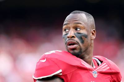 Harbaugh Disappointed in Vernon Davis's Absence - San Francisco 49ers coach Jim Harbaugh didn’t like the fact that star tight end Vernon Davis was a no-show for day one of the team’s mandatory minicamp Tuesday. &quot;I'm disappointed in that decision for them not to be here…[It's] not the decision I envision being the 49er way,&quot; Harbaugh told ESPN. Davis explained he’s holding out to leverage a higher salary as a guest columnist for Sports Illustrated on Monday.(Photo by Jeff Gross/Getty Images)
