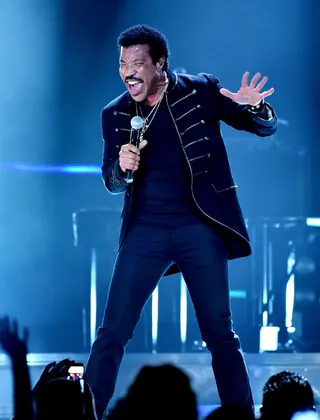 Hit After Hit - Legendary singer/songwriter and 2014 BET Lifetime Achievement Award recipient&nbsp;Lionel Richie&nbsp;performs during his &quot;All The Hits All Night Long&quot; tour with CeeLo at the Honda Center in Los Angeles. (Photo: Kevin Winter/Getty Images)
