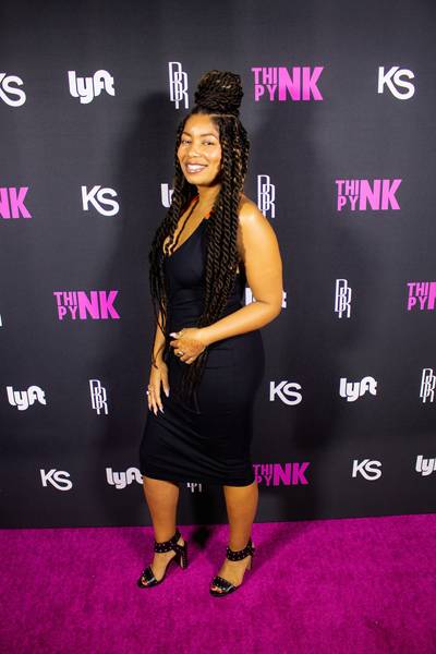 Fab Roc - DJ and creative producer, Fab Roc, strikes a pose on the &quot;Pynk&quot; carpet! (Photo: Calvin Gayle @calvingproductions)