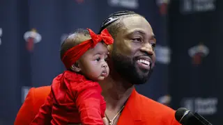 MIAMI, FLORIDA - APRIL 09: Dwyane Wade #3 of the Miami Heat addresses the media after his final regular season home game at American Airlines Arena with his daughter, Kaavia James Union Wade, on April 09, 2019 in Miami, Florida. NOTE TO USER: User expressly acknowledges and agrees that, by downloading and or using this photograph, User is consenting to the terms and conditions of the Getty Images License Agreement.  (Photo by Michael Reaves/Getty Images)