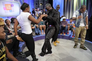 Dancing with a Star Pt. 1 - Akon dances with an audience member at BET's 106 &amp; Park.(Photo: John Ricard / BET)
