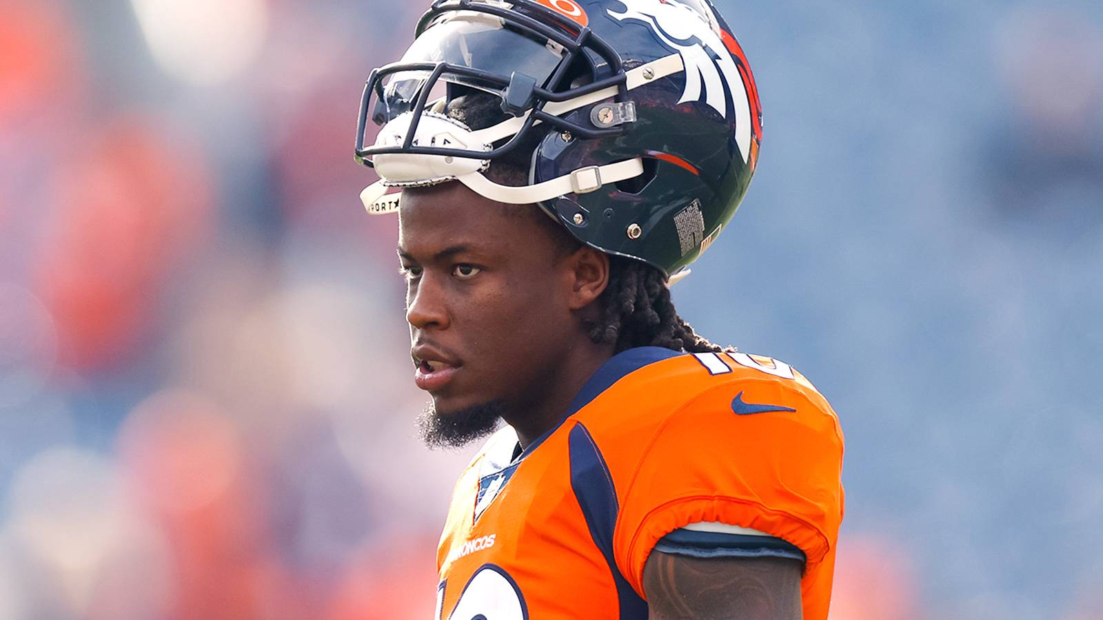Wide receiver Jerry Jeudy #10 of the Denver Broncos walks on the field before a game