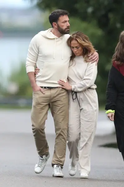 Jennifer Lopez and Ben Affleck - Love is in the air! Jennifer Lopez and Ben Affleck go out for an evening stroll in The Hamptons on the 4th of July weekend. JLo looks very affectionate with Ben as the lovebirds walk arm in arm in stride with each other all the way to the water's edge and back in matching outfits.&nbsp; (Photo: Patriot Pics / BACKGRID USA)