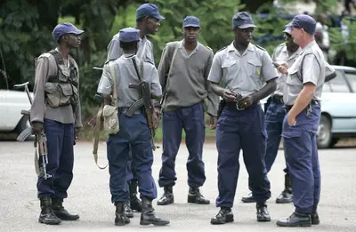 /content/dam/betcom/images/2013/06/Global/060513-global-zimbabwe-police-military-armed-forces.jpg
