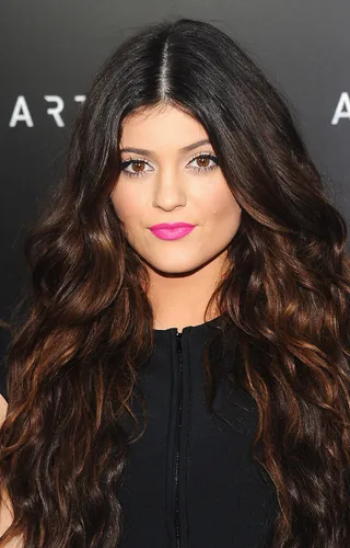 Kylie Jenner - Love this bright pink lipstick on Kylie. It’s painted on so neatly and gives her mouth great definition.(Photo: Jamie McCarthy/Getty Images for Mercedes-Benz)
