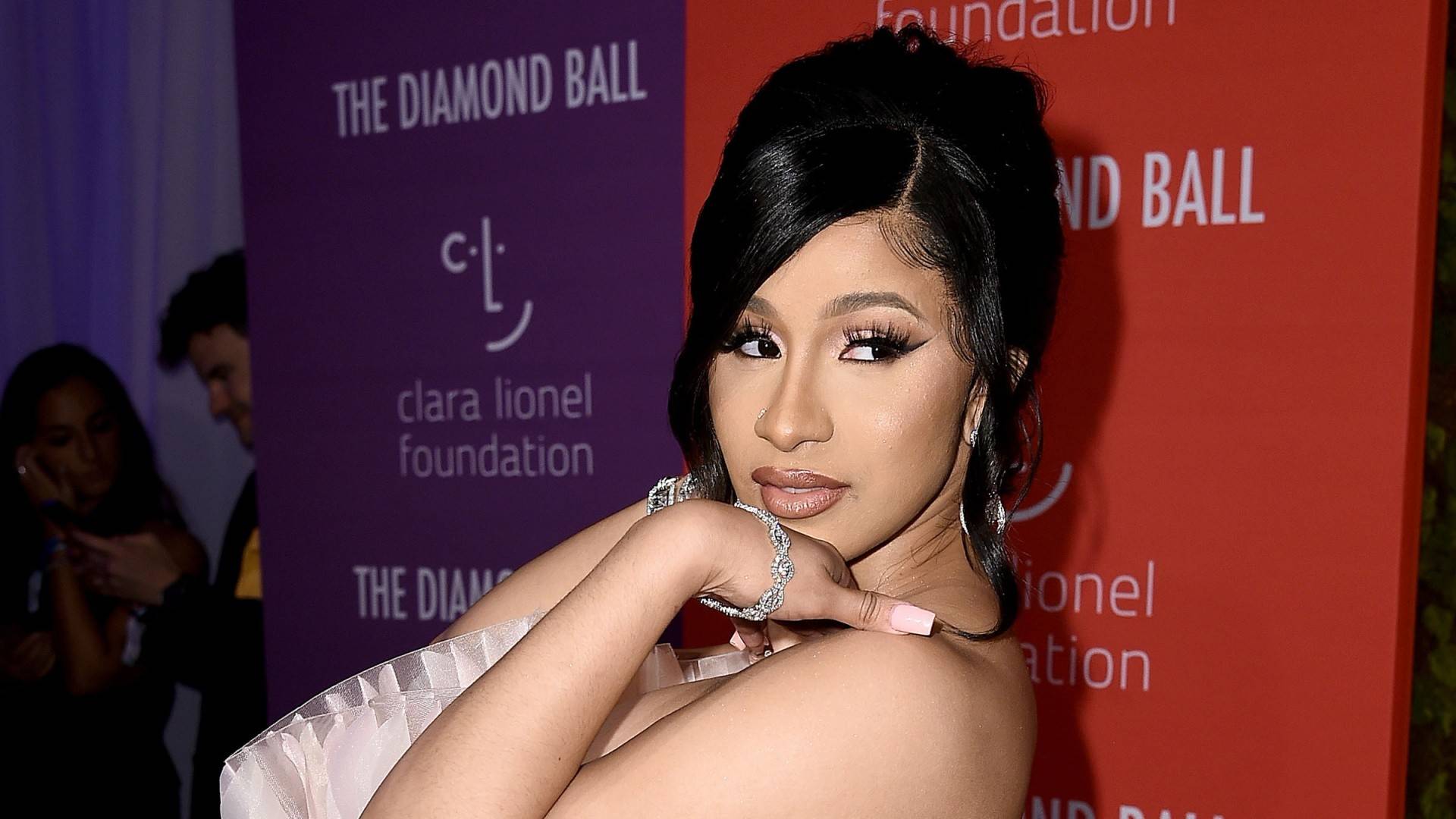 Cardi B Explains the Meaning of Face Tattoo, Unveils New One on