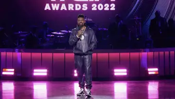 Host Deon Cole on stage at the BET Soul Train Awards 2022.