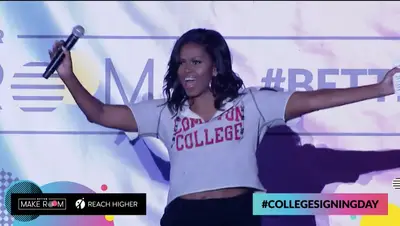 Cropped Casual Cutie - We love a great cropped look! Michelle Obama took the stage at the 2019 College Signing Day event wearing a grey, cropped 'Compton College' hoodie paired with black skinny jeans and Golden Goose low top, black sneakers ($515). (Photo courtesy of Better Make Room video via Facebook)