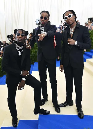 The Nawfside - The group is actually closer than many may think. These three are truly related and grew up together. Here’s the quick family rundown: Quavo (Quavious Keyate Marshall) is the uncle of Takeoff (Kirshnik Khari Ball) and Offset (Kiari Kendrell Cephus) is Quavo's cousin. The group started off as Polo Club prior to becoming Migos and they hail from Lawrenceville, Georgia, which is on the Northside&nbsp;— or the “Nawf” as Migos refers to it. &nbsp;&nbsp;(Photo: Theo Wargo/Getty Images)&nbsp;