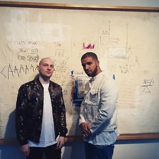 OVO Sound in the Building - Champagne Popi and his OVO Sound partner Oliver El-khatib looking at all the great artwork like nothing was the same.(Photo: Drake via Instagram)