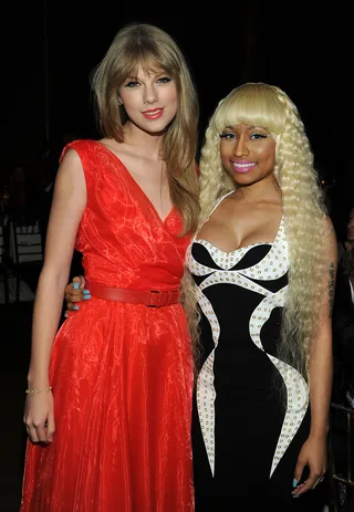 Girl Power - T-Swift showed she was down with the Barbs when she brought Nicki Minaj out as a surprise guest to perform her hit &quot;Superbass&quot; in 2011 during her concert stop in L.A. &nbsp;(Photo: Larry Busacca/Getty Images)