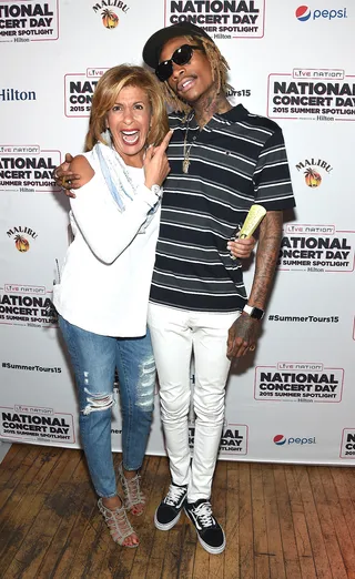 Music Lovers - Hoda Kotb&nbsp;cozies up with&nbsp;Wiz Khalifa&nbsp;on the red carpet of the Live Nation Celebrates National Concert Day at their 2015 Summer Spotlight Event at Irving Plaza in New York City.(Photo: Jamie McCarthy/Getty Images for Live Nation)