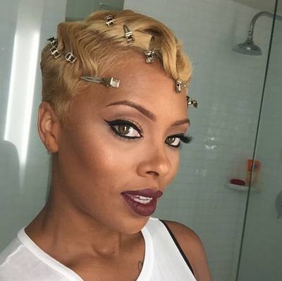 Eva Marcille @evamarcille - While the model waits for her curls to set, she takes a quick selfie.  (Photo: Eva Marcille via Instagram)