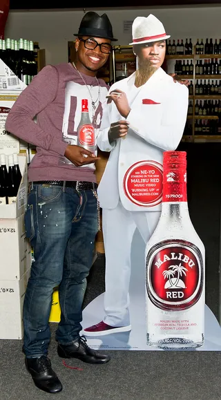 Seeing Double\r - Ne-Yo poses with a cardboard cutout in his image for his new role as spokesman for Malibu Red at Pennsylvania Wine &amp; Spirits Store in Philadelphia. \r\r\r(Photo: Gilbert Carrasquillo/Getty Images)