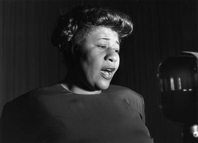 Ella Fitzgerald - Always one to pave the way, Ms. Ella took the stage during the halftime show of Super Bowl VI in New Orleans in1972 ? making her the first African-American artist to perform on the big stage.(Photo: George Konig/Keystone/Getty Images)