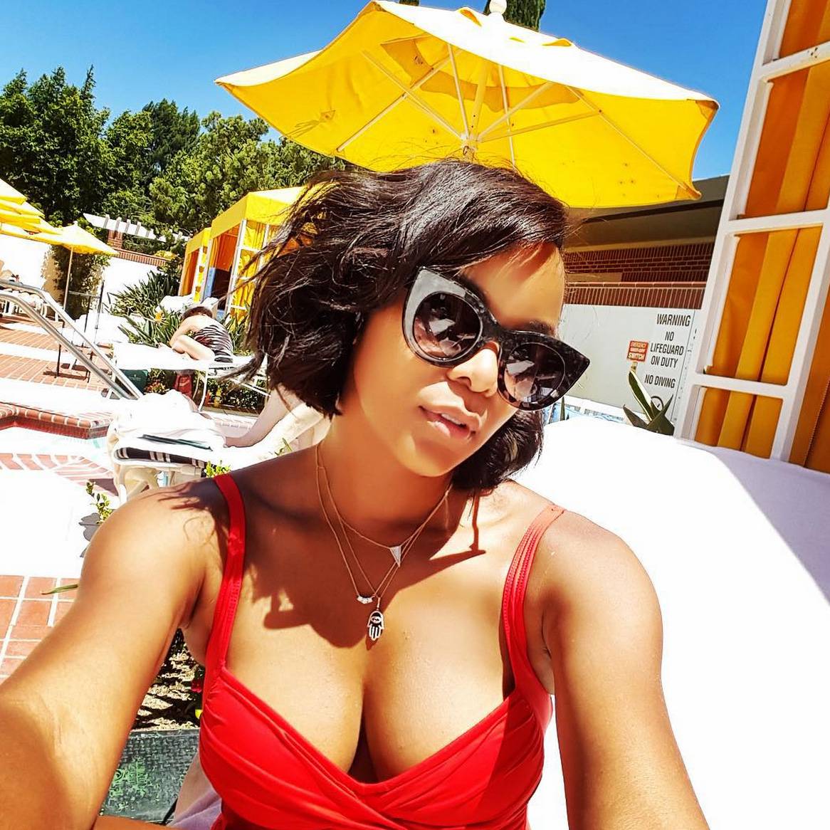 Vanessa Bryant is a bathing beauty in Versace swimsuit on vacation