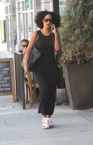 Keep It Casual - Tracee Ellis Ross rocks a comfy maxi-dress and sneakers while chatting on her cellphone as she goes shopping in Beverly Hills.(Photo: WENN.com)