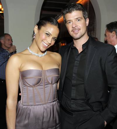 Robin Thicke and Paula Patton - Sultry singer Robin Thicke exchanged vows with his wife actress Paula Patton back in June of 2005. The two celebs welcomed their first child, Julian Fuego Thicke, in April of last year. (Photo: Kevin Winter/Getty Images for AFI)