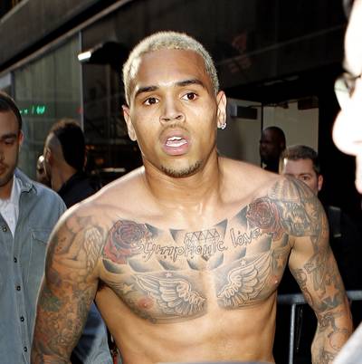 The Evolution of Chris Brown - Unfortunately, for Chris Brown, one step forward has sometimes also meant a step back. After a heated 2011 interview on ABC's Good Morning America&nbsp;in which Brown was asked repeatedly about Rihanna, he became violently angry during a commercial break, damaging a backstage window and then storming off the set shirtless.(Photo: INFphoto.com)