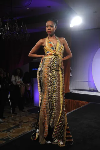 Bold Prints - A model walks the runway in a printed halter dress.&nbsp;  (Photo: Brad Barket/PictureGroup)