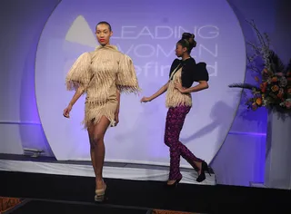 Fringe Benefits - Two models rock ensebles with wheat-hued fringe as playful accents.   (Photo: Brad Barket/PictureGroup)