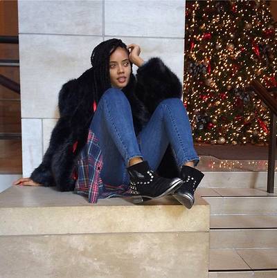 Angela Simmons - “Holiday time in NYC,” the fashion designer writes on her IG page. Hey Ang, we’re adding your studded suede booties to our wish list!&nbsp;  (Photo: Angela Simmons via Instagram)