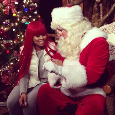 Blac Chyna - “Santa and I choppin it up!” the fashion designer writes on Instagram, making good use of her wish list session with Santa. We wonder what she asked for this year?  (Photo: Black Chyna via Instagram)