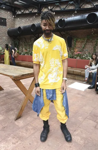 Ty Hunter - Stylist Ty Hunter shines in his yellow-on-yellow getup at LaQuan Smith's presentation at NYFW.&nbsp;(Photo: Vivien Killilea/Getty Images)