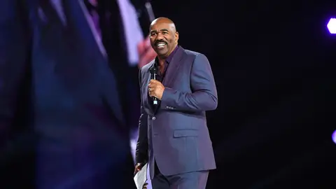 ATLANTA, GEORGIA - MARCH 21:  Steve Harvey speaks onstage during 2019 Beloved Benefit at Mercedes-Benz Stadium on March 21, 2019 in Atlanta, Georgia. (Photo by Paras Griffin/Getty Images)