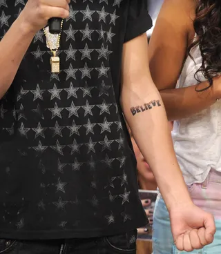 You Gotta Beli-ieb - Justin Bieber shows off his tattoo "Believe" that he got done for the release of his album at 106 &amp; Park, June 22, 2012. (Photo: John Ricard / BET)