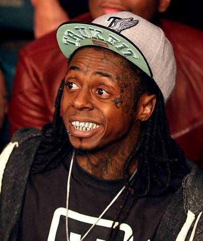 Lil Wayne - Lil Wayne has come a long way since his grimy Hot Boys days. Not only is he a pop star who skateboards and plays guitars, but he's released a rap-rock album, 2009's Rebirth. (Photo: Al Bello/Getty Images)