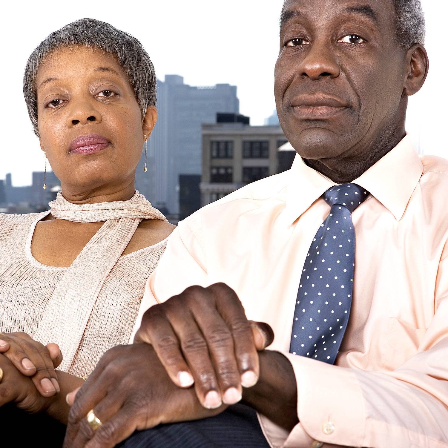 Mature Couple Sitting Side by Side