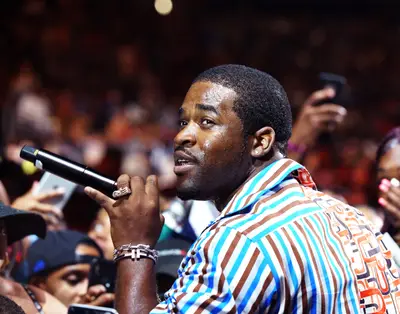 Ferg In The Middle Of What Looks Like A Serenade - (Photo: Bennett Raglin/Getty Images for BET)