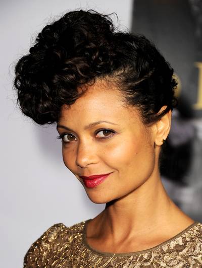 Thandie Newton - Thandie Newton gives us a modern take on the pompadour. Copy the actress' look by smoothing curls back and then up and securing with hairpins. (Photo: Kevin Winter/Getty Images)