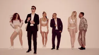 2. Robin Thicke feat. Pharrell and T.I., &quot;Blurred Lines&quot; - Despite ugly lawsuits and being accused of promoting date rape in his lyrics, Robin Thicke put the sexy back into '70s dance music with this monster jam about a girl getting seduced. The cut's rhythm is eerily reminiscent of Marvin Gaye's 1977 &quot;Got to Give It Up,&quot; but nonetheless, established Mr. Thicke as an R&amp;B power broker in 2013. &nbsp;   (Photo: Star Trak)