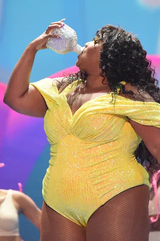 Lizzo is a strong - Image 10 from Barbiecore!: Lizzo Perfectly Coordinates  Her Bright Pink Hair With A Pink Leopard Print Ensemble