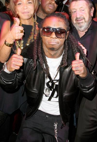 4. Lil Wayne, $15 million (tie) - 50 Cent once said that being in jail is the only excuse for being broke, but that didn?t stop Weezy. His new album I Am Not a Human Being debuted at No. 1?the first time since Tupac a rapper topped the charts while incarcerated. Wayne hit the ground running when he got out, rocking 24 cities with his I Am Music II tour and leading his Young Money label to benchmark year with the successes of Drake and Nicki Minaj.\r&nbsp;\r(Photo: Valerie Macon/Getty Images)