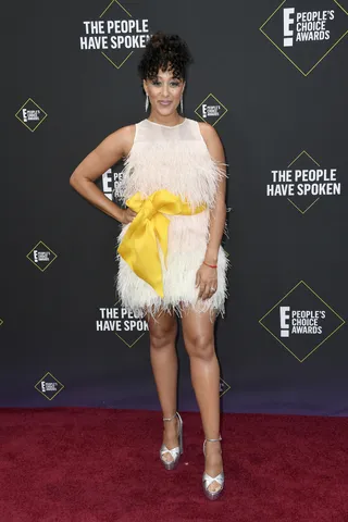 Tamera Mowry-Housley - We can't deny that&nbsp;Tamera Mowry-Housley&nbsp;brightened up the red carpet with her bright-yellow satin bow. Take note of how&nbsp;The Real&nbsp;co-host perfectly paired her feathery&nbsp;Cynthia Rowley cocktail dress with the statement-making accessory.(Photo: Frazer Harrison/Getty Images) (Photo: Frazer Harrison/Getty Images)